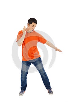 Young man imitate a karate expert with fight stance