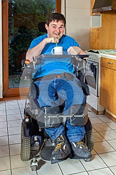 Young man with infantile cerebral palsy.