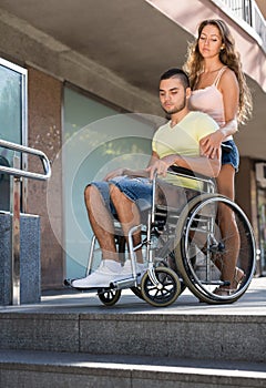 Young man on invalid chair