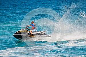 Young Man on Jet Ski, Tropical Ocean