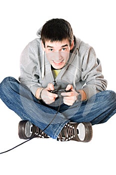 Young man with a joystick for game console