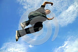 Young man jumping in air