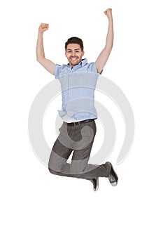 Young Man Jumping With Arms Raised