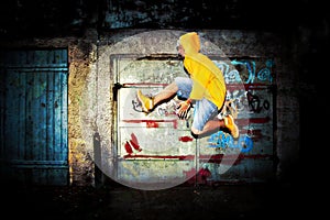 Young man jumping, grunge