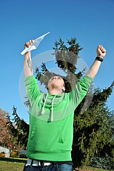 Young man jumping for joy