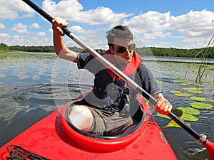 Young man on Kayak photo
