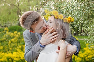 Young man kissing woman. Couple in love