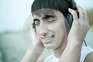 Young man listen to music