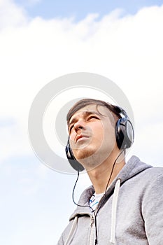 Young Man listen to the Music