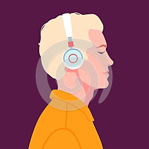 Young man listen to music on headphones. Music therapy.