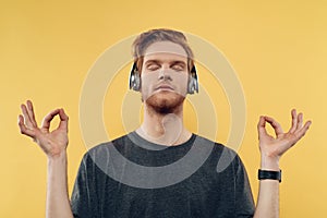Young Man Listening to Music With Headphones