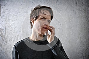 Young man with a look of evil