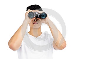 Young man looking through binocular