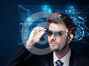 Young man looking with futuristic smart high tech glasses