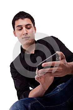 Young man looking at his smart phone.