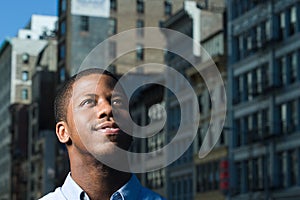 Young man looking up