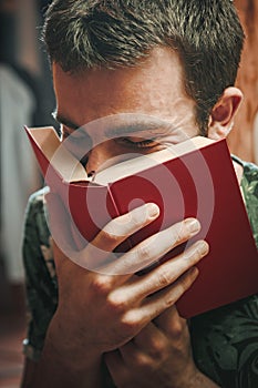 Young man loves to read books