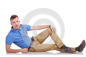 Young man lying on the floor