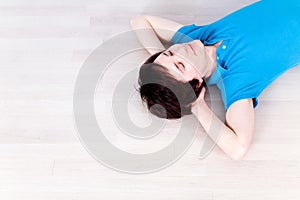 Young man lying on floor