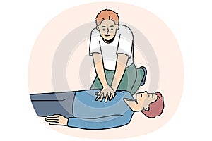 Young man make heart massage to person on ground