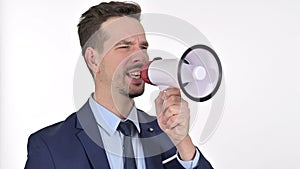 Young Man making Announcement on Loudspeaker , White Background