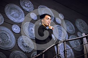 Young man making hush gesture - quiet or secret sign