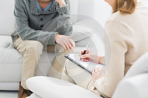 Young man in meeting with a psychologist photo