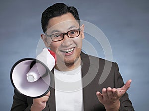 Young Man With Megaphone Advertisement Concept, Smiling Expression