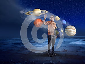 Young man in middle of solar system