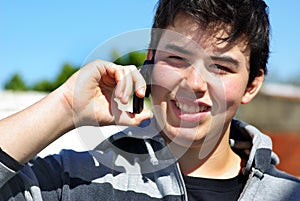 Young man and mobil phone.