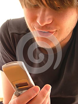 Young man & mobile phone
