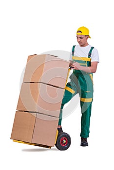 The young man moving boxes with cart isolated on white