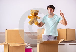 The young man moving to new apartment