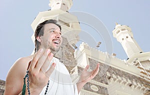 Young man, muslim pilgrim photo