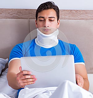 The young man with neck injury in the bed