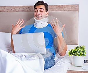 Young man with neck injury in the bed