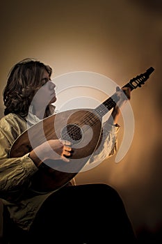 Young Man with Old Oud Guitar Lute