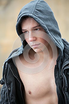 Young Man in Open Hooded Jacket