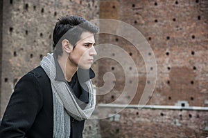 Young Man Outside the Building Looking to Right