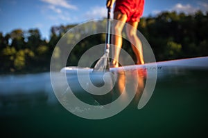 Young man on a paddle board