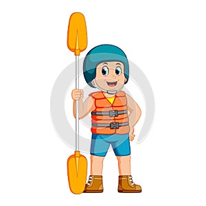 Young man with paddle and a safety vest
