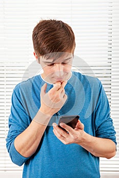 Young Man with a Phone