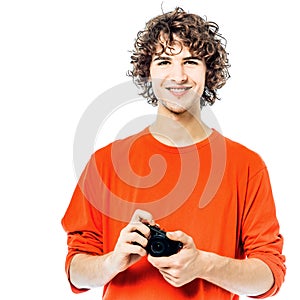 Young man photographer holding camera portrait