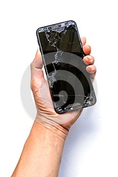 A young man picked up his smartphone from the floor and found that the smartphone he had picked up had a cracked screen.