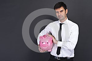 Young man with piggy bank