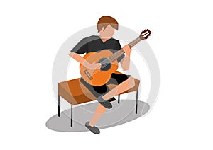 Young man playing an acoustic classical guitar