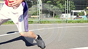 Young man playing basketball