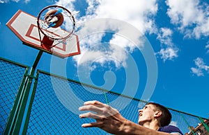 Young man playing basketball