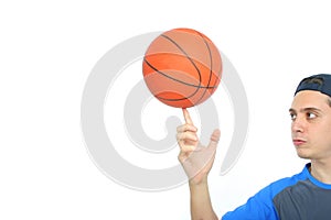 Young man playing basketball isolated