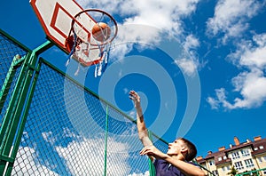 Young man playing basketball